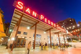 A brightly lit San Pedro's sign is seen at night.